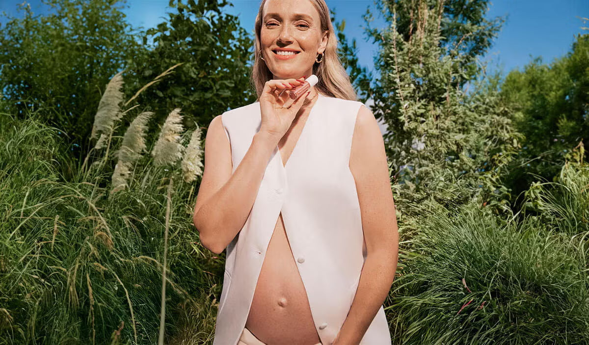 pregnant woman using well people makeup